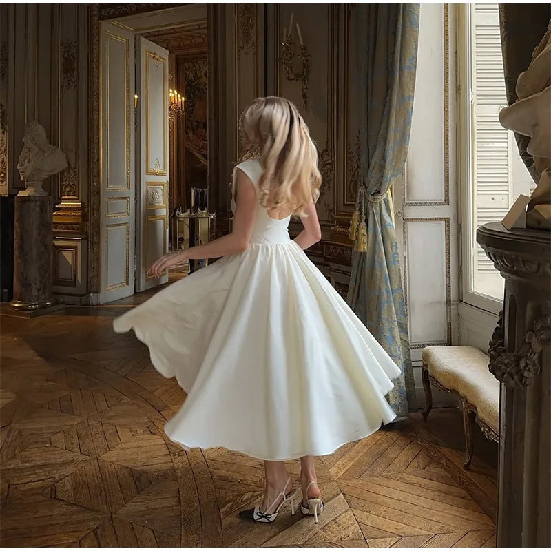 Fashion Backless O-neck A-line Dress For Women Elegant Short Sleeve High Waist Maxi Dresses 2025 New Street Vocation Robes