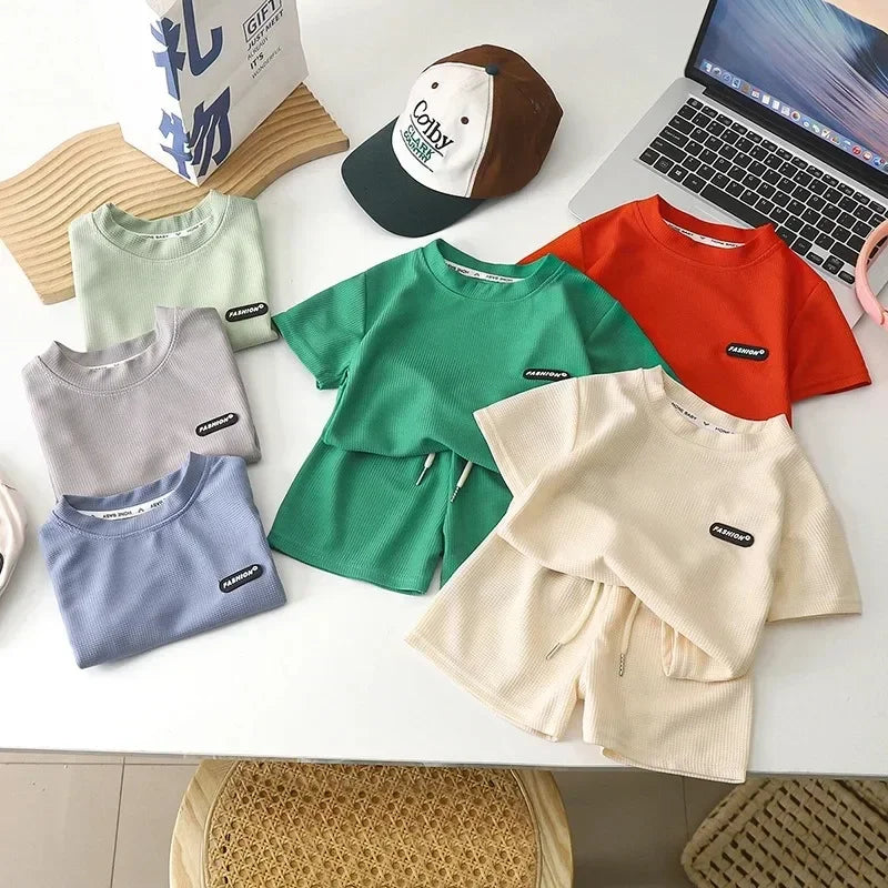 2Pcs Fashion Children Short Sleeve Shorts Sets Summer Kids Clothes Boy Girl Baby Cotton Tee Pant Outfits Soild Color Tracksuits